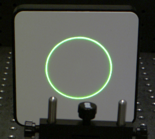 Figure 2 : Lumière laser verte d’un axicon à L = 228,6 mm